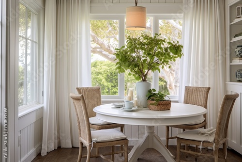 Seaside Elegance  Small Coastal Cottage Dining Area with Round Table and White Drapes