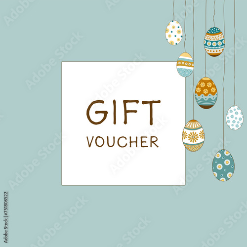 Gift Voucher - Schriftzug in englischer Sprache - Geschenkgutschein. Quadratische Gutscheinkarte mit hängenden Ostereiern auf einem türkisfarbenen Rahmen.