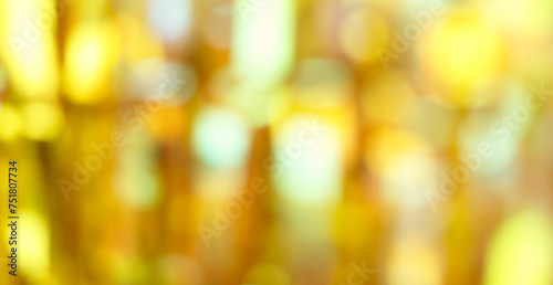 Golden color blurred abstract background, Christmas and New Year golden background © Alex