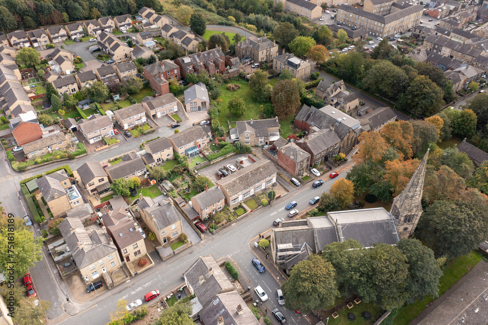 Aerial photo of the town of Heckmondwike Wakefield in the UK, showing a typical British housing estate with a parking sign on the road that says permit holders only.