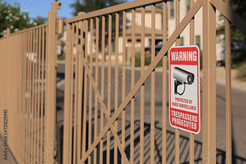 Warning Sign at Residential Housing Community Entrance Gate