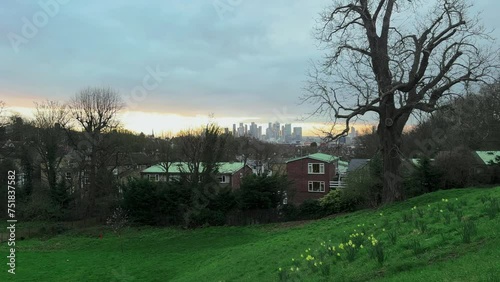 A view of Canary Wharf, the financial centre of London, at sunset in spring photo