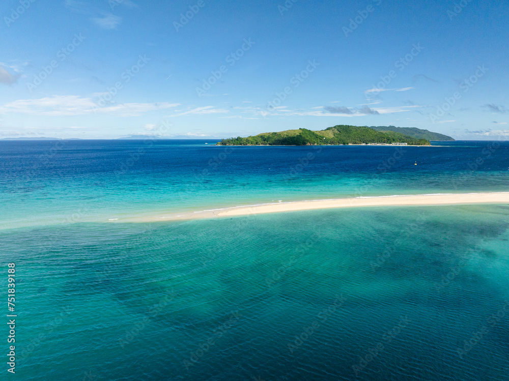 Sandbar with clear turquoise water and waves. Bon Bon Sandbank. Romblon Island. Romblon, Philippines.