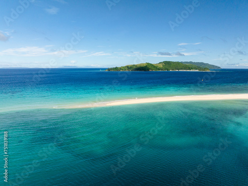 Sandbar with clear turquoise water and waves. Bon Bon Sandbank. Romblon Island. Romblon, Philippines. © MARYGRACE