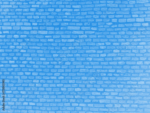 A blue wall formed of small bricks. a good background for a wallpaper for a teenager, a wall for a photo booth or for interior design with an industrial, loft character. 
