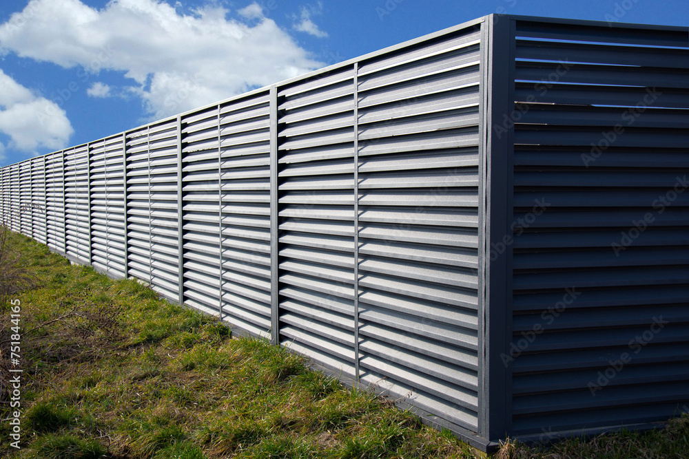 Modern metal profile fence with shutters or blinds Modern metal profile fence with shutters or blinds