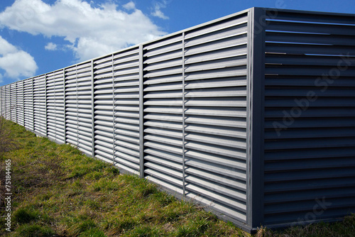Modern metal profile fence with shutters or blinds