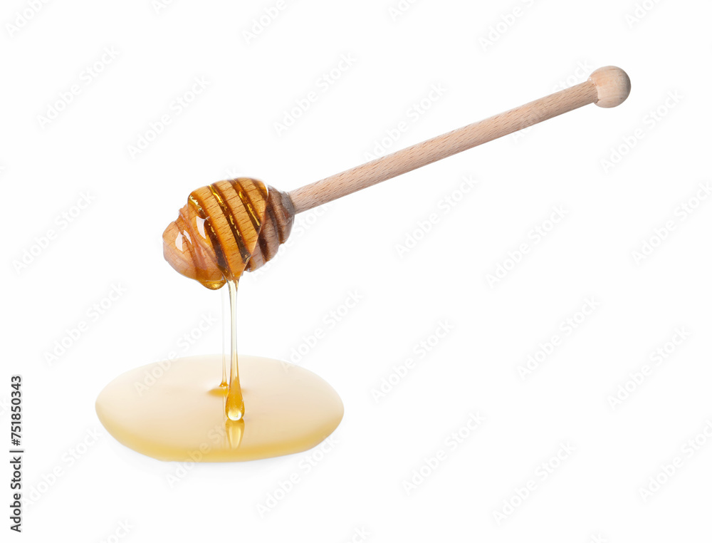 Fresh honey dripping from dipper on white background