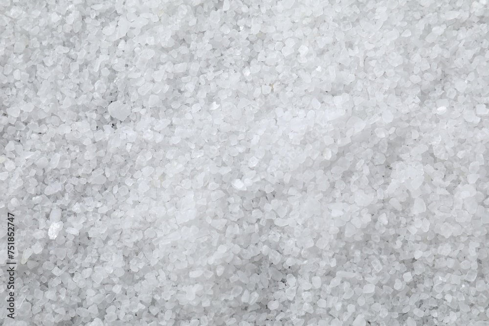 White natural salt as background, top view White natural salt as background, top view
