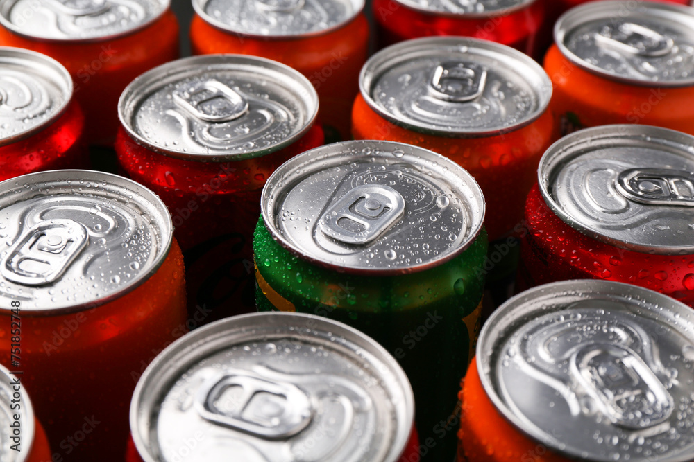 Energy drink in wet cans, closeup. Functional beverage Energy drink in wet cans, closeup. Functional beverage