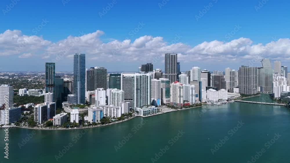 Breathtaking aerial view of Brickell City Centre in Miami. Stunning architecture of skyscrapers. Clear sky creating serene and picturesque atmosphere Breathtaking aerial view of Brickell City Centre in Miami. Stunning architecture of skyscrapers. Clear sky creating serene and picturesque atmosphere