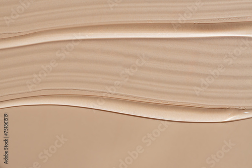 Cosmetic foundation and serum swatches on surface photo