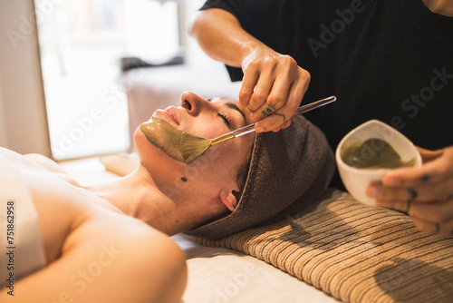 Relaxing facial treatment at a wellness spa photo
