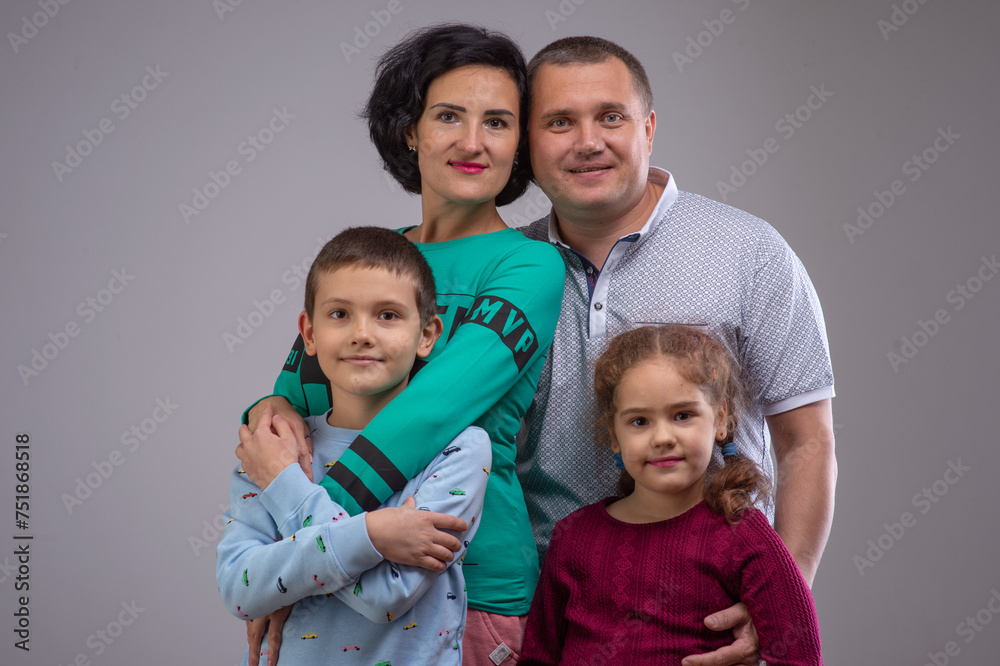 studio portrait of a happy family husband wife daughter and son 9 studio portrait of a happy family husband wife daughter and son 9