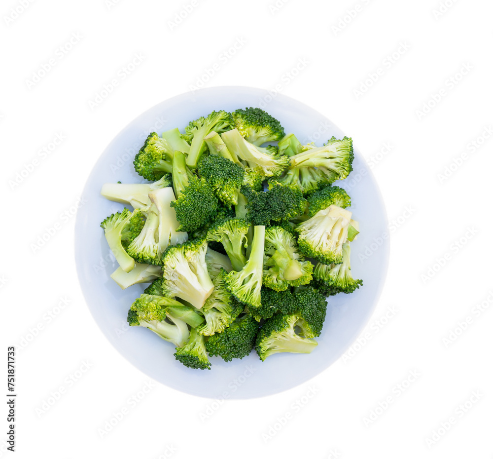 Fresh cuts of raw broccoli on white plate. A healthy choice for your fiber nutrition and vitamin supplement for your strong body. Rich minerals. Good elements for food, groceries or cooking concepts. Fresh cuts of raw broccoli on white plate. A healthy choice for your fiber nutrition and vitamin supplement for your strong body. Rich minerals. Good elements for food, groceries or cooking concepts.