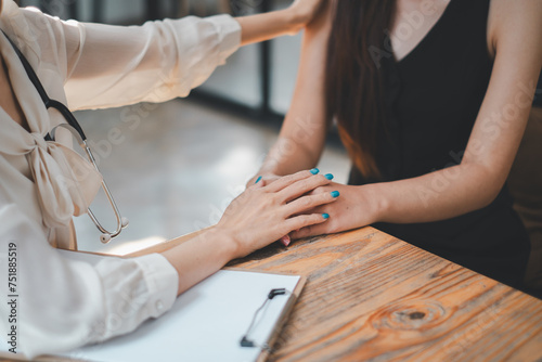 Employee receives a consultation from a healthcare professional, discussing health matters in a modern office environment.