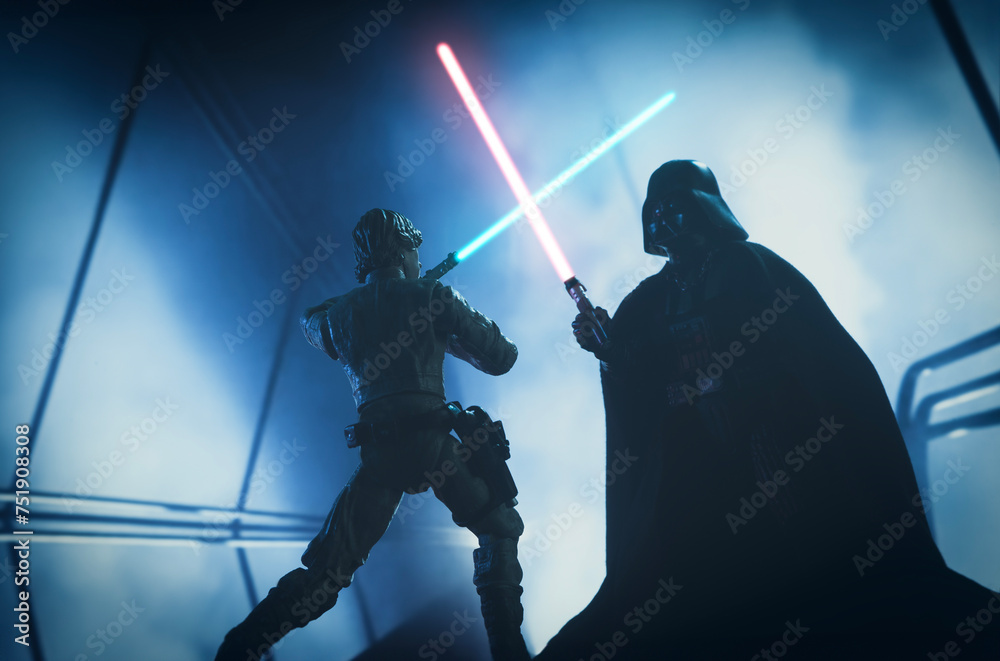 Naklejka premium NEW YORK USA, MAR 10 2024: recreation of a scene from Star Wars The Empire Strikes Back with Jedi Luke Skywalker battling Sith lord Darth Vader in the carbonite freezing chamber on Bespin - Hasbro