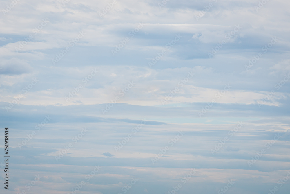 Calm skies with soft streaks of clouds that look like watercolor strokes on a canvas. Subtle shades of blue and gray create an atmosphere of peace and relaxation Calm skies with soft streaks of clouds that look like watercolor strokes on a canvas. Subtle shades of blue and gray create an atmosphere of peace and relaxation