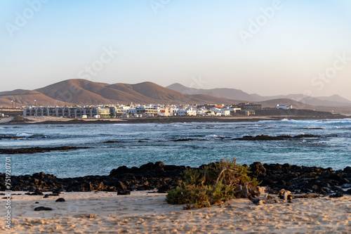 West coast of Fuerteventura island. Winter sea and sun vacation in El Cotillo touristic village  Canary islands  Spain. White sandy beach La Concha..