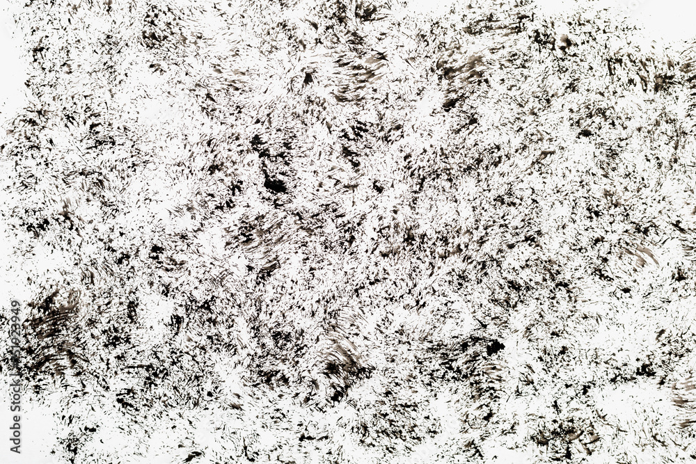Chaotic traces of black paint on a white paper canvas. Blank for design, graphic resource