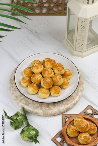 Kue Nastar or Pineapple tart cookies, Indonesian popular cookies during lebaran or hari raya, Eid al fitr and Eid al Adha. Ramadan Islamic theme for text and background.
 photo