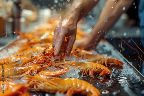 A hand grabbing a rock shrimp from a pile on the table, food culinary