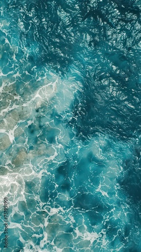 Blue sea water texture background. Top view of the sea surface. © Christiankhs
