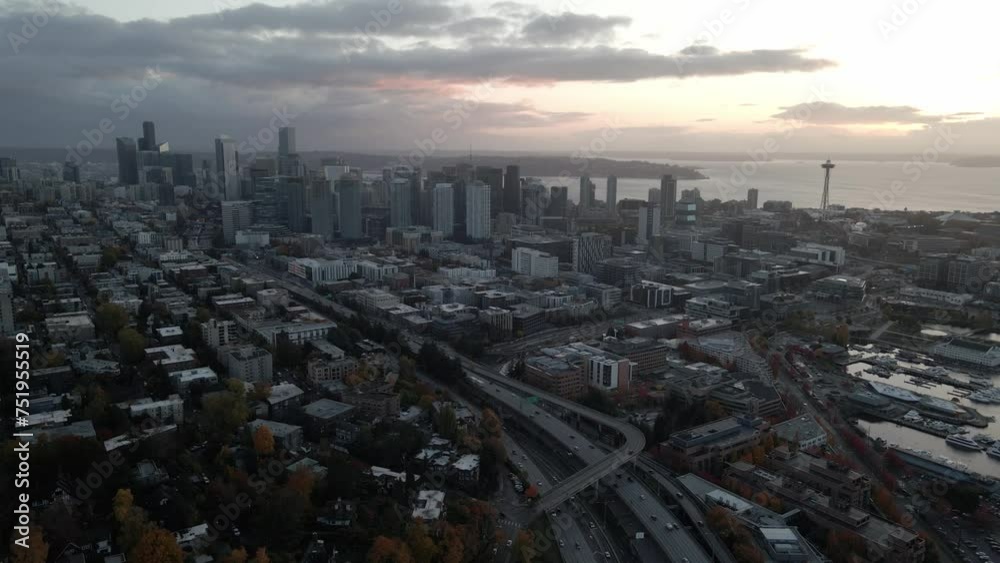 Aerial establishing shot of the Seattle Skyline under moody lighting Aerial establishing shot of the Seattle Skyline under moody lighting