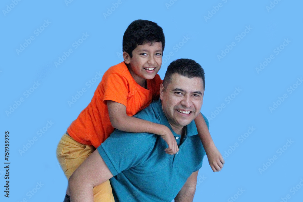 Divorced single dad and his 9-year-old dark-skinned Latino son play and spend quality time and fun celebrating Father's Day Divorced single dad and his 9-year-old dark-skinned Latino son play and spend quality time and fun celebrating Father's Day