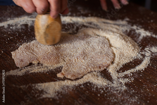 Photography of chicken milanesa preparation. Food preparation concept.