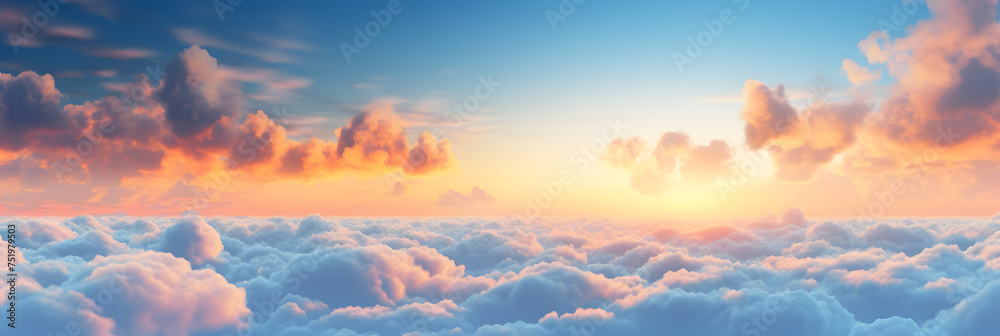Voluminous Clouds Illuminated by a Warm Glow Set Against a Distant Landscape in a Majestic Sky