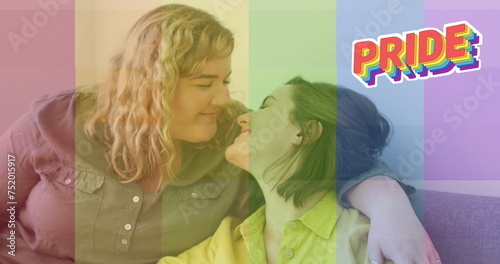 Image of rainbow flag over lesbian couple kissing
