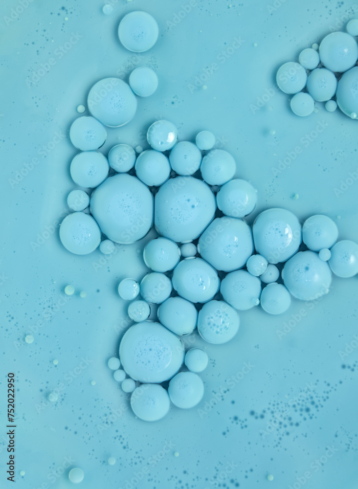 Blue floating bubbles. 3d rendering. Textures of liquid paint.