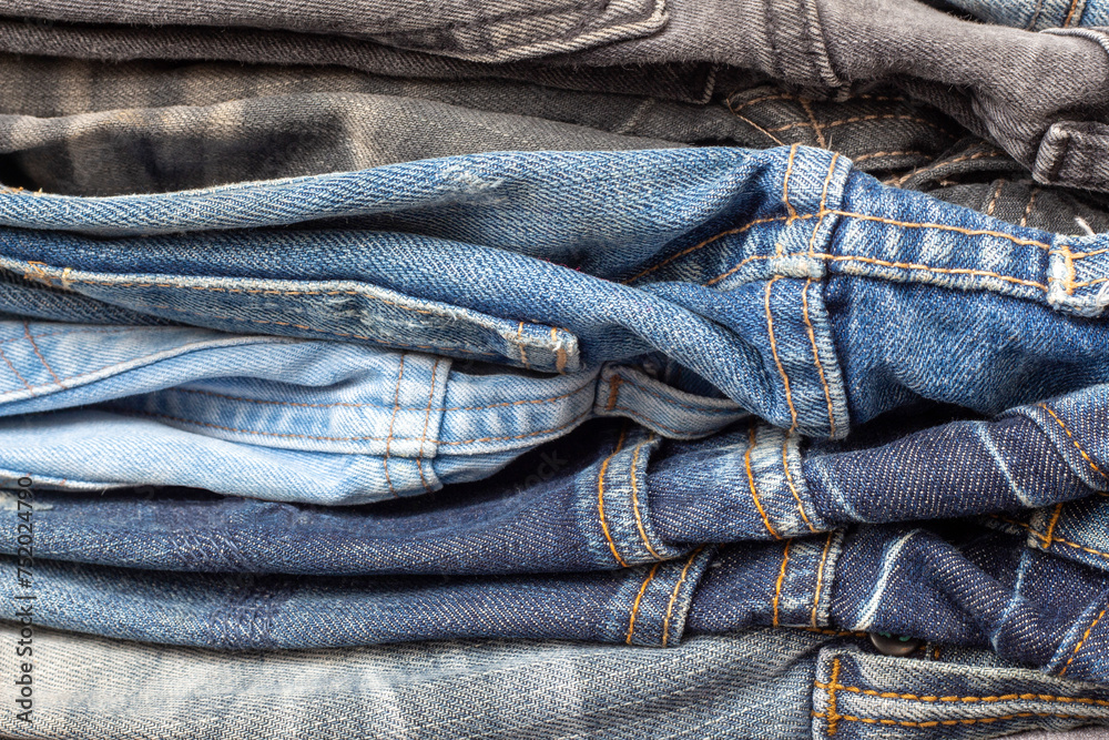Stack of Various Colors of Jeans, Denim background texture Stack of Various Colors of Jeans, Denim background texture