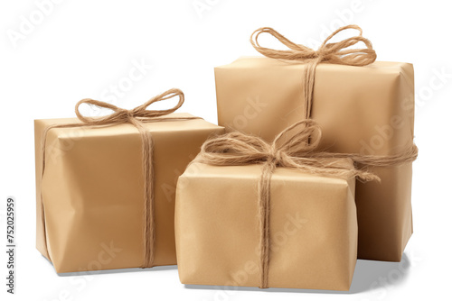 Three brown packages on white
