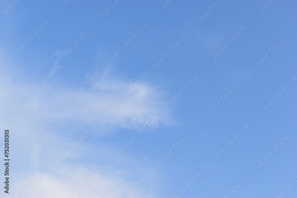 Fototapeta premium beautiful blue sky and white fluffy cloud with sunrise in the morning, natural background