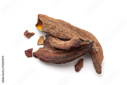 A pile of Dry Organic Zebrawood or Kakda Singi (Pistacia integerrima) isolated on a white background. Top view photo