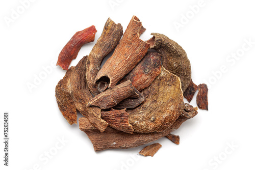 A pile of Dry Organic Zebrawood or Kakda Singi (Pistacia integerrima) isolated on a white background. Top view photo