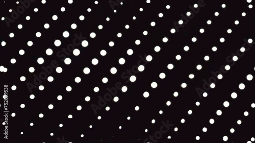 A black and white photo of a pattern of dots
