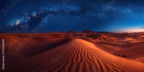 A desert panorama under the night sky adorned with twinkling stars.
