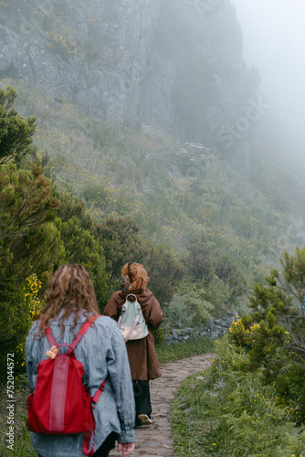 Hikers along summit trail to Pico Ruivo on Madeira Island in Portugal