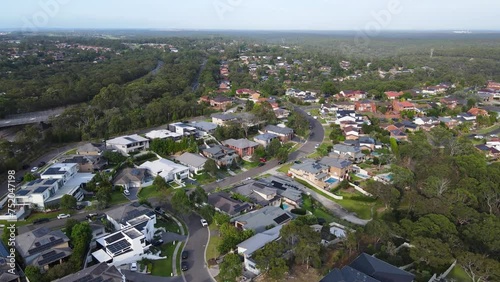 Aerial drone view of Menai, in the Sutherland Shire, South Sydney, NSW Australia on the western side of Alfords Point Road on a sunny morning in March 2024 photo