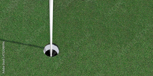 Close-up horizontal color photo looking down into an empty golf cup hole. Copy space.
