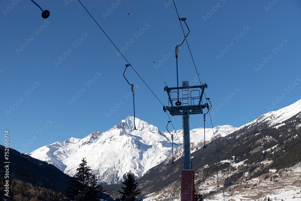 Ski lift ascending to Mont-Cenis, a massif in the French Alps