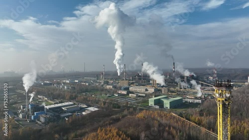 Aerial view of Coking Plant factory. Coke plant.Heavy industry in Europe, Poland, Dabrowa Gornicza. Air pollution from chimneys. Gas combustion in a coking plant.Ecology and environmental.  photo