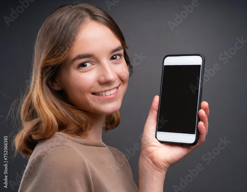 Woman holding mobile smartphone with blank screen, concept of digital nation or digital age , online technology lifestyle with addiction to social media