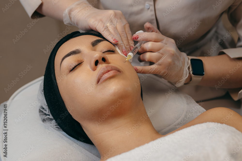 Facial injection in a beauty salon Facial injection in a beauty salon