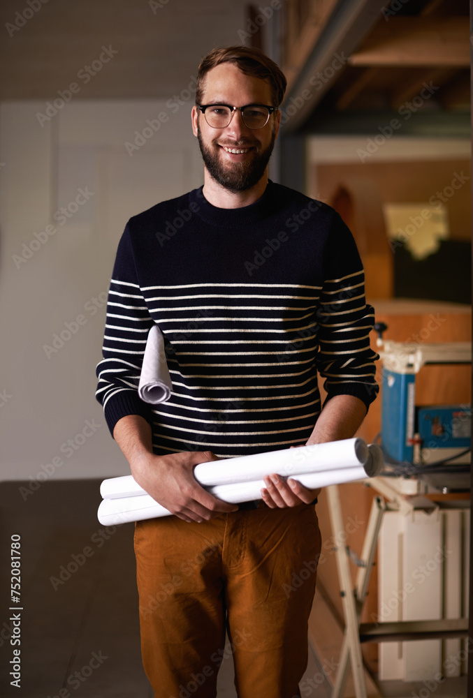 Fototapeta premium Portrait, smile and man with blueprint, architect and real estate development with ideas and glasses. Person, employee and engineering with documents or maintenance with renovation, smile or property