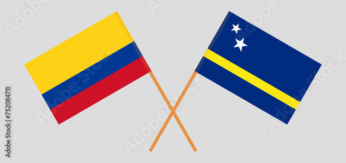 Crossed flags of Colombia and Country of Curacao. Official colors. Correct proportion