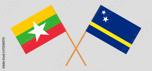 Crossed flags of Myanmar and Country of Curacao. Official colors. Correct proportion